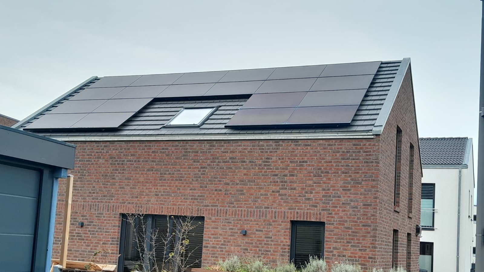 Sanierungsfahrplan Besprechung mit Unterlagen und Gebäudeplänen